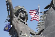 Statue with American flag