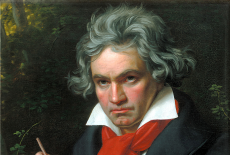 Portrait of Beethoven holding a manuscript and a pencil