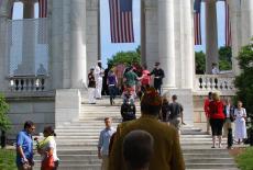 Visitors arrive to the Memorial Amphitheater at Arlington National Cemetery on Memorial Day 2013.