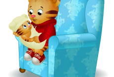 Daniel Tiger holds his new sister, Baby Margaret