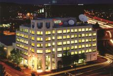 External photo of the WETA building at night. 