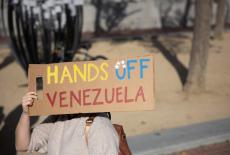 Demonstrators gather to protest against U.S. military action against Venezuela