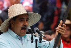 FILE PHOTO: Government supporters march to commemorate the Battle of Santa Ines, in Caracas