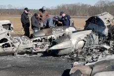 NTSB investigators view the wreckage of a Cessna 550 business jet after several people were killed in a crash in Statesville