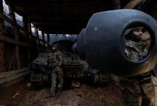 Ukrainian serviceman fire a self-propelled howitzer towards Russian troops near the frontline town of Kostiantynivka