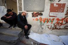 Funeral of Palestinians who, according to medics, were killed by Israeli strike on Saturday, at Al-Shifa Hospital in Gaza ...