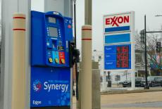 Gas prices are seen at a fuelling station as the price of oil and gas has surged amid the U.S.-Israeli conflict with Iran,...