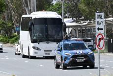 A bus carrying members of the Iranian Women's Asian Cup team arrives at the Gold Coast Airport