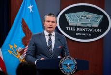 U.S. Secretary of Defense Pete Hegseth and Chairman of the Joint Chiefs of Staff General Dan Caine hold a briefing amid th...