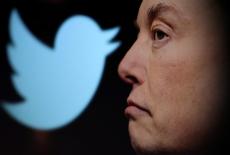 FILE PHOTO: Illustration shows Elon Musk photo and Twitter logo