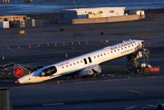 FILE PHOTO: Air Canada Express jet collides with a ground vehicle at LaGuardia airport