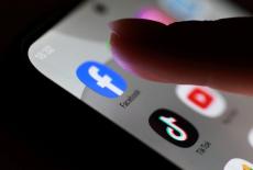 Illustration shows Facebook app