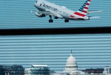 An American Airlines jet takes off from at Washington Reagan National Airport in Arlington, Virginia
