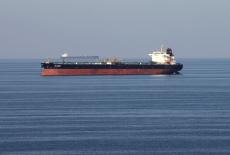 Oil tankers pass through the Strait of Hormuz
