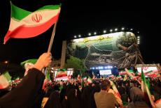 People take part in an anti-U.S. and anti-Israel rally at Enghelab Square amid a ceasefire between U.S. and Iran, in Tehran