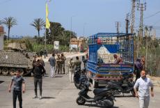 Aftermath of an Israeli strike that severed the last remaining bridge linking southern Lebanon to the rest of the country,...