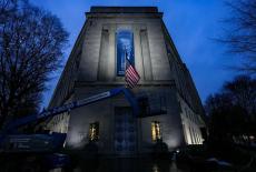 New banner depicting U.S. President Donald Trump is put up on the Department of Justice building in Washington, D.C.