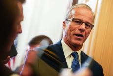Senate Majority Leader John Thune speaks to reporters in Washington