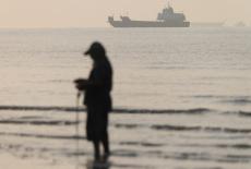 Vessels in the Strait of Hormuz are visible near the beach of Bandar Abbas