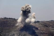 Smoke rises following an Israeli strike as seen from Marjayoun