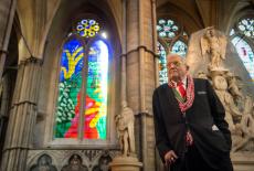 FILE PHOTO: British artist David Hockney poses in front of The Queen's Window, a new stained glass window he has designed,...