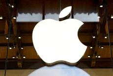 FILE PHOTO: FILE PHOTO: Apple's logo at its store in Paris