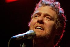FILE PHOTO: Irish musician Glen Hansard performs on stage during a concert in Prague