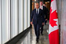 Canada's Prime Minister Mark Carney suspends trade negotiations with the U.S.