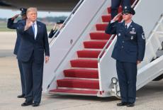 U.S. President Trump disembarks Air Force One at Joint Base Andrews