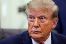 US President Donald Trump and Vice President JD Vance make an announcement in the Oval Office of the White House in Washin...