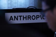 Anthropic's logo is displayed at a media briefing marking the one-year anniversary of the opening of Anthropic's office in...