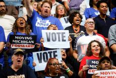 Supporters cheer during a campaign rally for Democratic US Senate nominee Abdul El-Sayed and Democratic gubernatorial cand...