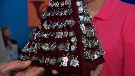 Appraisal: 20th C. Articulated Silver & Gold Charms: asset-mezzanine-16x9