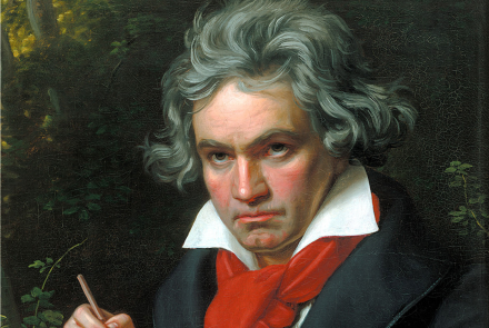 Portrait of Beethoven holding a manuscript and a pencil
