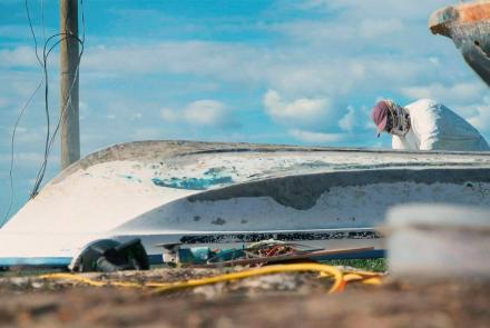 A Local Fisherman Works to Restore Damaged Boats: asset-mezzanine-16x9