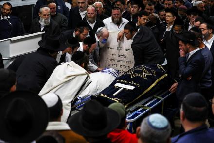 News Wrap: Israel mourns victims of synagogue shooting: asset-mezzanine-16x9
