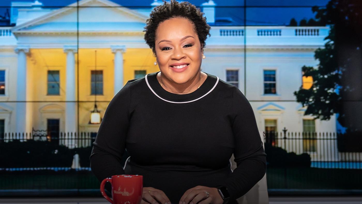Yamiche Alcindor, host and moderator of Washington Week, seated on the set.