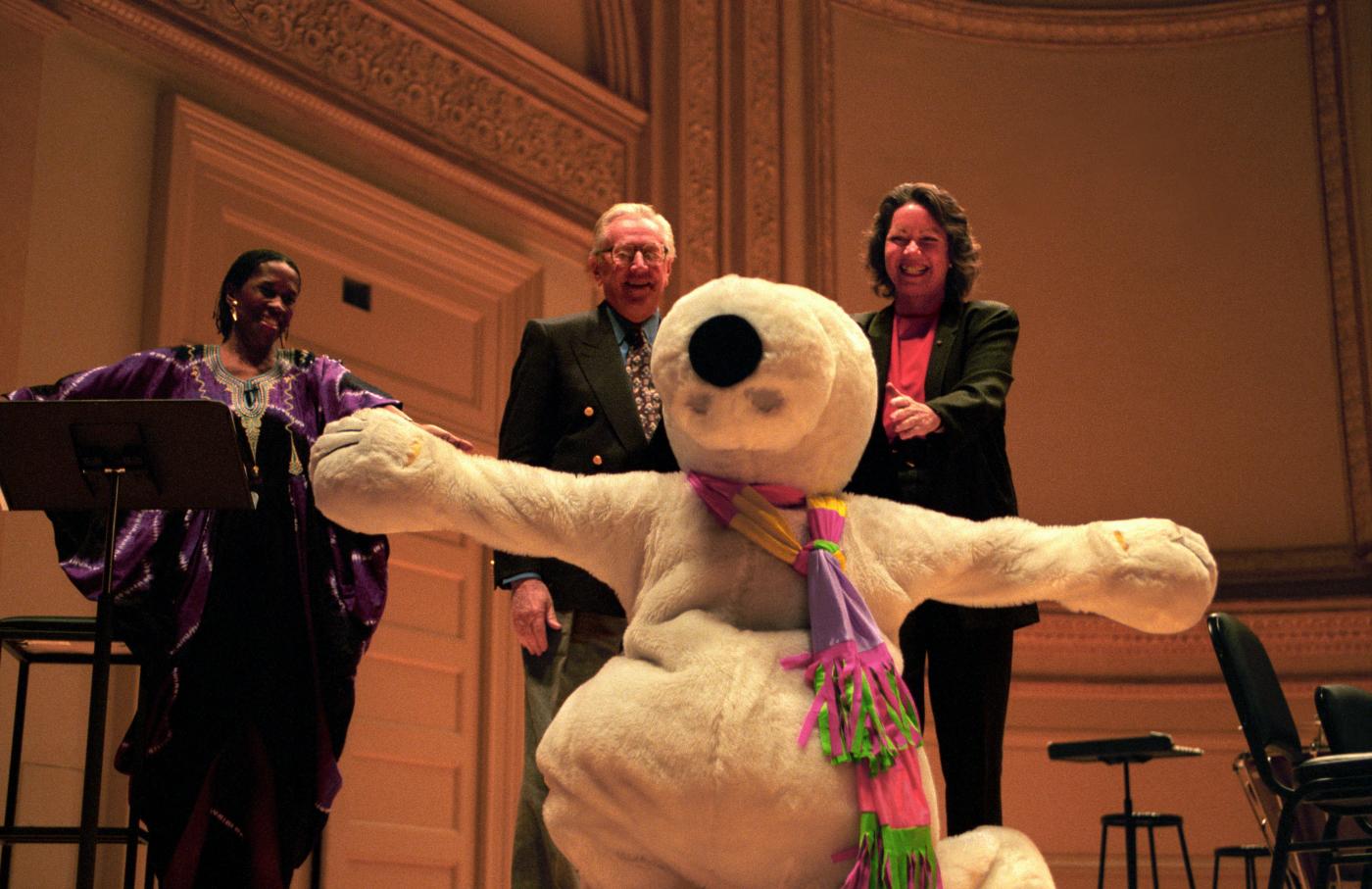 Ellen with Snoopy and Charles Shulz at the premiere of Peanuts Gallery