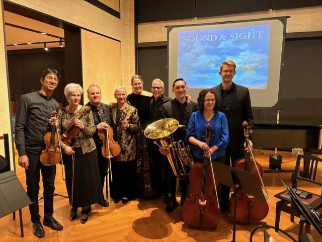 A group shot of the musicians and composer after the performance.