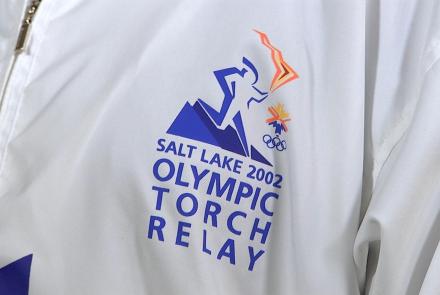 Appraisal: 2002 Salt Lake City Olympic Torch & Runners Suit: asset-mezzanine-16x9